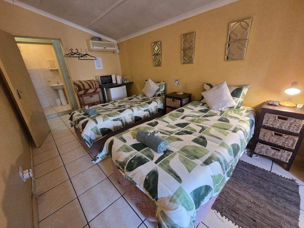 Guest room at At Home Guesthouse Upington, photo 1